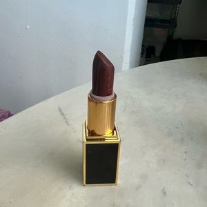 Tom Ford Black Dahlia lipstick, used.